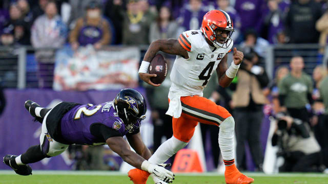 Nov 12, 2023; Baltimore, Maryland, USA; Cleveland Browns quarterback Deshaun Watson (4) runs with the ball as Baltimore Ravens defensive tackle Justin Madubuike (92) defends during the second half at M&T Bank Stadium. Mandatory Credit: Jessica Rapfogel-USA TODAY Sports